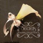 Artificial White Calla Lily and Snowberries Wristlet with Dangling Pearls (Front View)