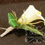 Artificial White Calla Lily Boutonniere with Silver Ribbon Wrap and Double Pearl Pins (Front View)