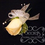 Fresh Champagne Rose and Pittosporum Pin-On Corsage with Pearl Strands Accent (Side View)