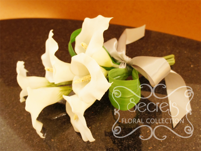 Artificial 6-bloom White Calla Lilies Bridesmaid Bouquet with Silver Satin Bow (Side View) - Toronto Wedding Flowers Created by Secrets Floral Collection