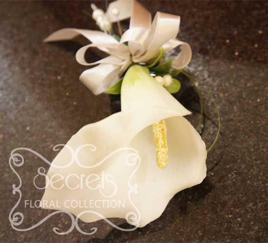 Artificial White Calla Lily and Snowberries Wristlet with Dangling Pearls (Top View) - Toronto Wedding Flowers Created by Secrets Floral Collection
