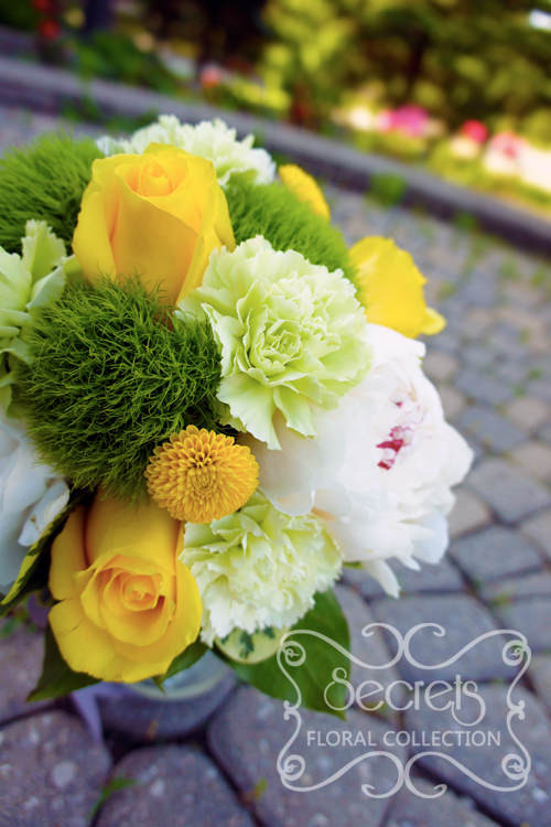 Fresh white peonies, yellow roses, green trick dianthus, and yellow button mums toss bouquet, with silver ribbon wrap (close-up) - Toronto Wedding Flowers Created by Secrets Floral Collection
