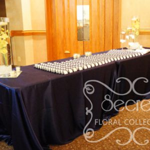 Navy Blue Receiving Table with Orchid Arrangements