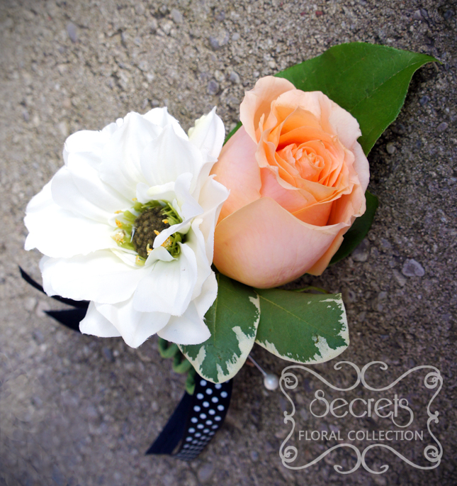 Fresh peach rose and white dahlia boutonniere, embellished with black and white polka-dot ribbon (top-view) - Toronto Wedding Flowers Created by Secrets Floral Collection