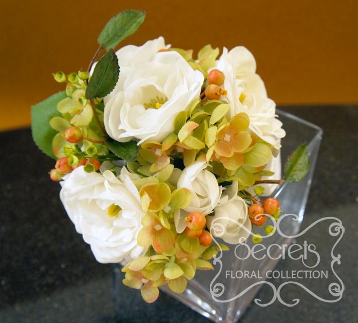 Artificial (real-touch) white ranunculus, green hydrangea, red privet berries, and eucalyptus toss bouquet (Top View) - Toronto Wedding Flowers Created by Secrets Floral Collection