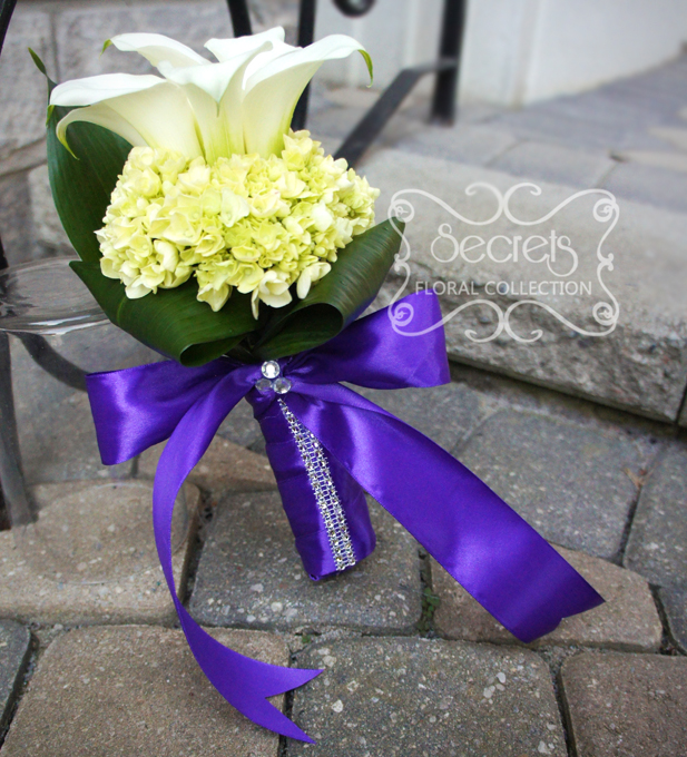Fresh white calla lilies and baby green hydrangea junior bridesmaid bouquet, with royal purple satin wrap and crystal embellishments (front-view) - Toronto Wedding Flowers Created by Secrets Floral Collection