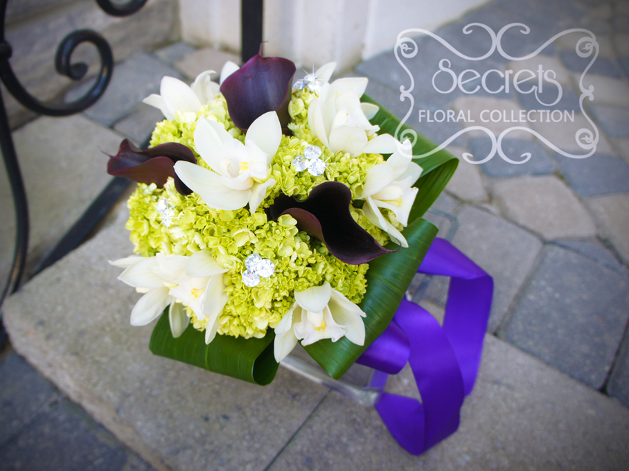 Fresh cream cymbiudium orchids, purple calla lilies, and baby green hydrangea bridal bouquet, with crystal bouquet jewelry and royal purple satin wrap (top-view) - Toronto Wedding Flowers by Secrets Floral Collection