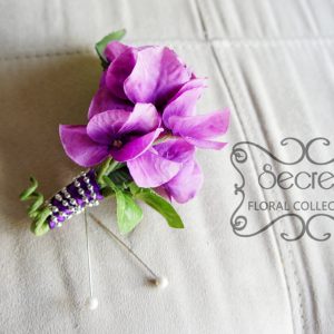 Artificial lavender hydrangea boutonniere with purple ribbon and silver beads wrap (front-view) - Toronto Wedding Flowers Created by Secrets Floral Collection