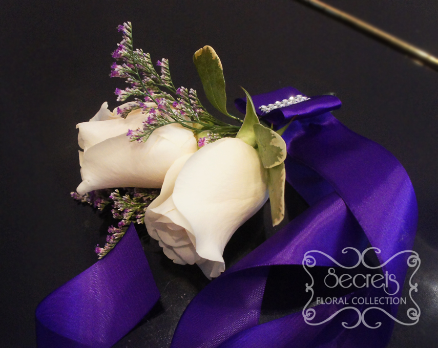 Fresh double-bloom cream roses and purple limonium wristlet, with large royal purple bow (top-view) - Toronto Wedding Flowers Created by Secrets Floral Collection