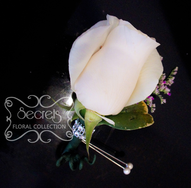 Fresh cream rose and purple lumonium boutonniere, embellished with crystallized bling ribbon (front-view) - Toronto Wedding Flowers Created by Secrets Floral Collection