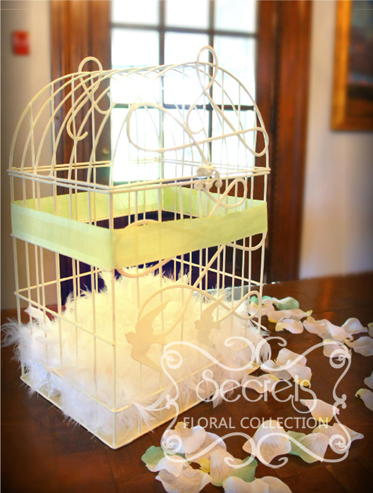 Close-up of our birdcage money box, perfect match for a vintage-inspired wedding