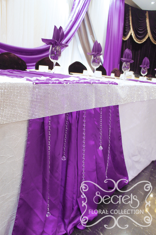 Close-up of head table. The crystal strands add a lot of glitz to the table