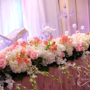 Long Head Table Floral Arrangement with Cream Hydrangea, Carnations, Dendrobium Orchids, Pink Roses, and Coral Alstromeria