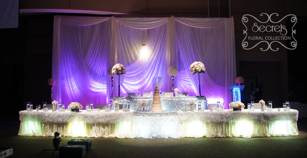 A Cream and Pink Wedding Reception Decoration Filled with Crystals and Ruffles at Paramount Conference & Event Venue - Toronto Wedding Decor Created by Secrets Floral Collection