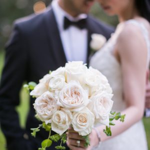 Bridal bouquet with white and cream garden roses. Flower by Secrets Floral.